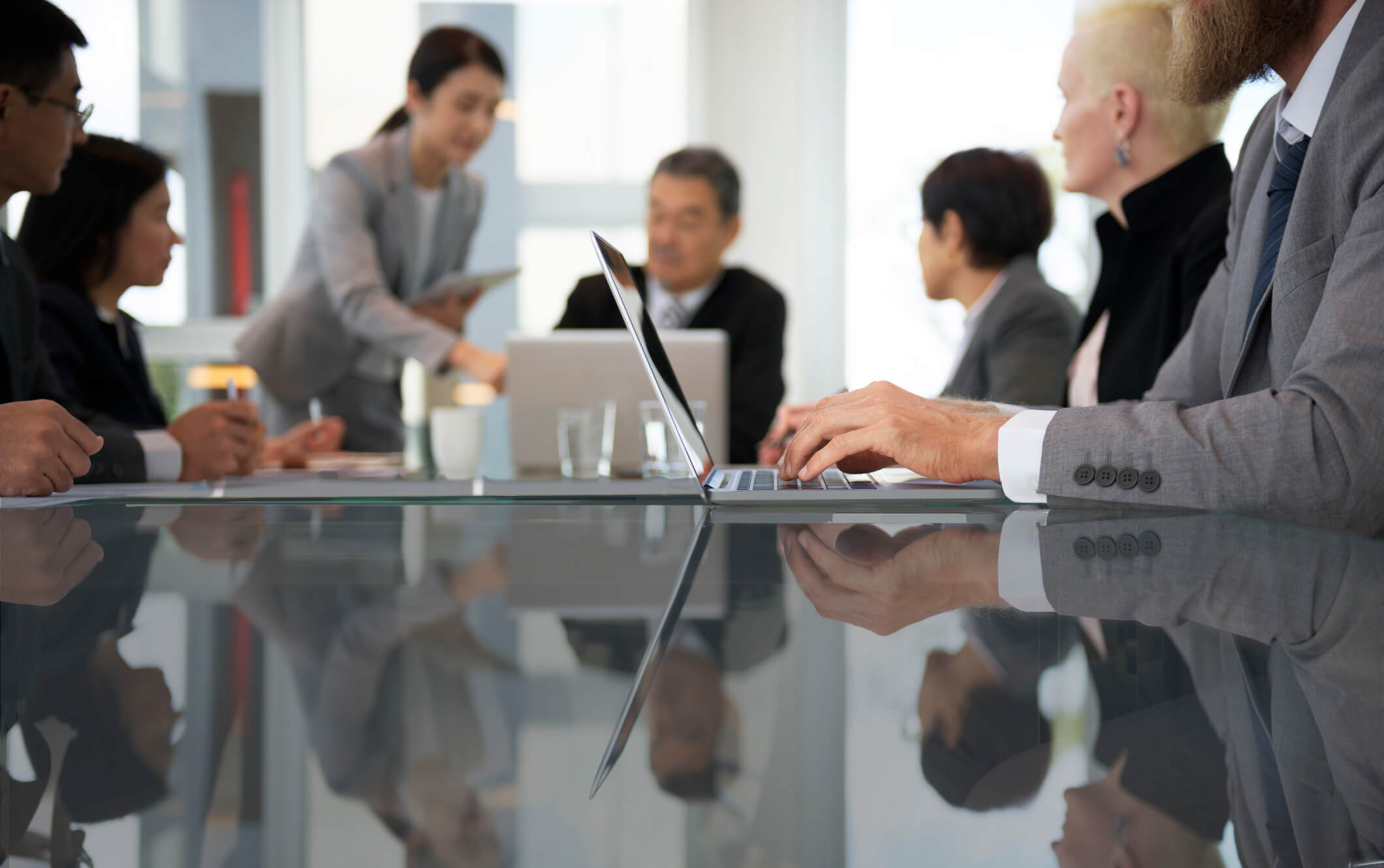 Directors and officers at a board meeting